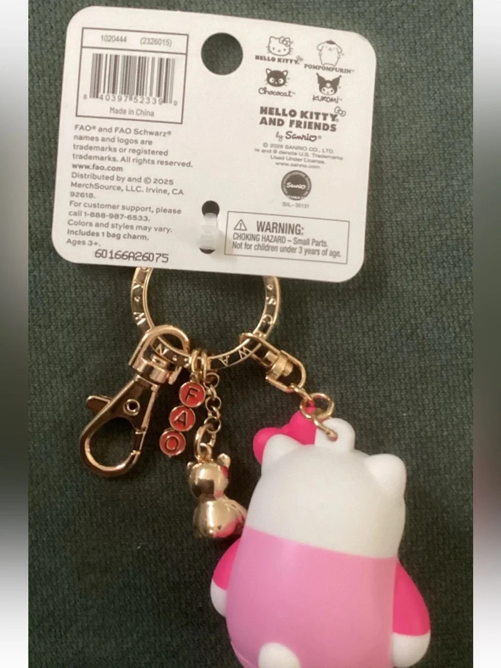 NWT FAO Schwarz Hello Kitty Pink and White Bag Charm Keychain
